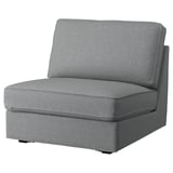 A grey KIVIK modular sofa section in light grey fabric, featuring a clean, minimalist design with a slight herringbone pattern.