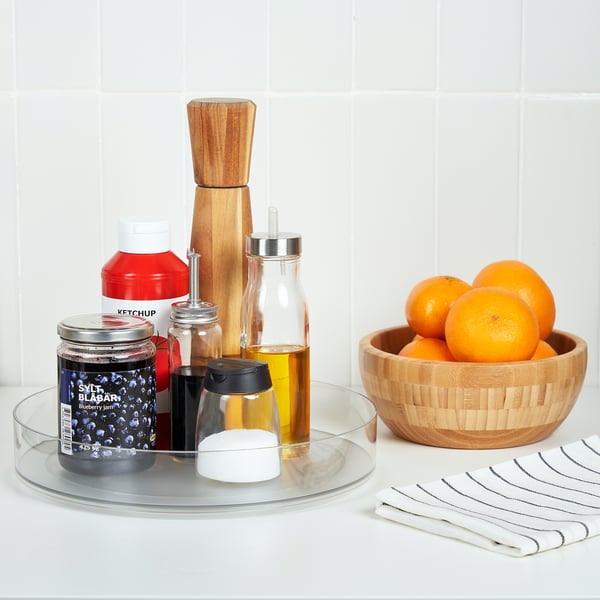 Turntable, fridge organiser. Holds bottles, jars. Rotates 360°, keeps items secure.