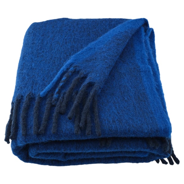 KLIPPOXEL: soft, blue, folded throw blanket, made of recycled polyester.