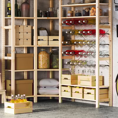 Wooden storage shelves with red wine racks, jars, boxes, metal racks, and bottles. Light wood boxes handle heavy loads, stacking for space efficiency.