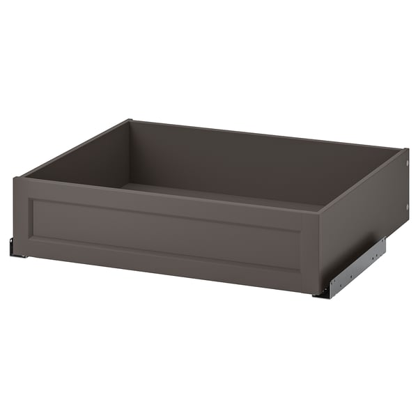 A grey KOMPLEMENT drawer, rectangular in shape with a smooth finish. Its designed for storage and has a modern, sleek appearance.