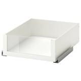 A white KOMPLEMENT drawer with a glass front, featuring a sleek modern design for easy storage access, supported by metallic runners.