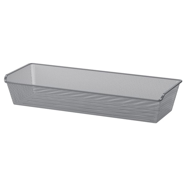 Grey KOMPLEMENT steel mesh basket, rectangular, perforated for air circulation.