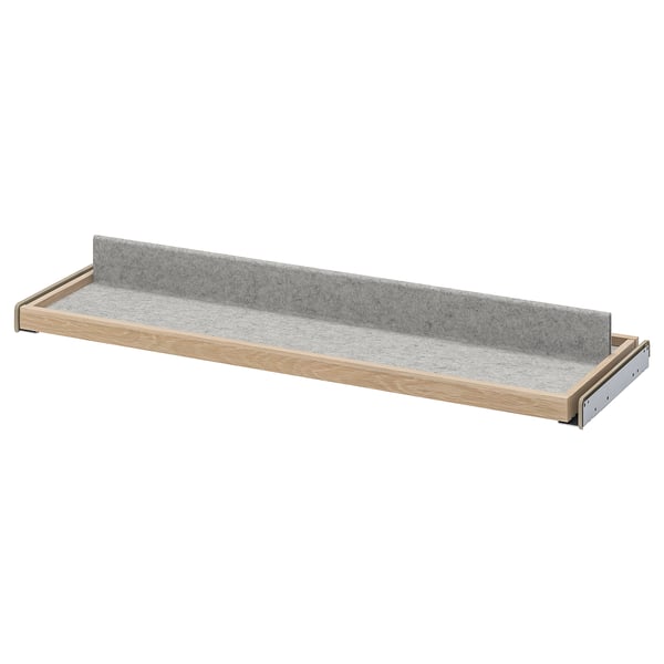 KOMPLEMENT gray felt shelf, light wood frame, single row, wall-mounted storage tray with metal brackets.