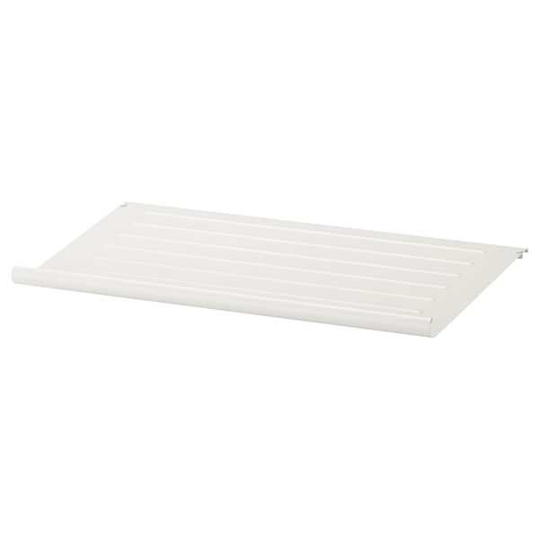 KOMPLEMENT slanted metal shoe shelf with contoured edge.
