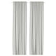 Two white floor-length block-out curtains with rod pockets, simple, elegant decor.