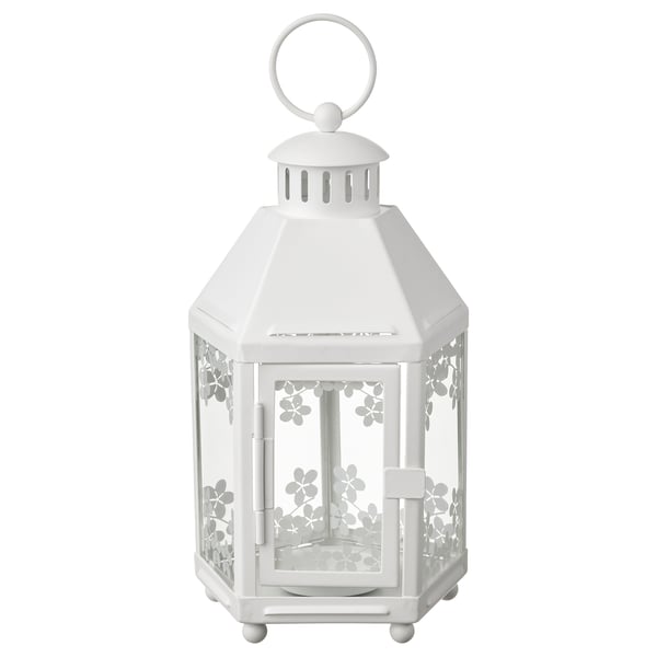 White KRINGSYNT lantern. Hexagonal shape with floral glass design. Hangs or stands, made of steel and glass.