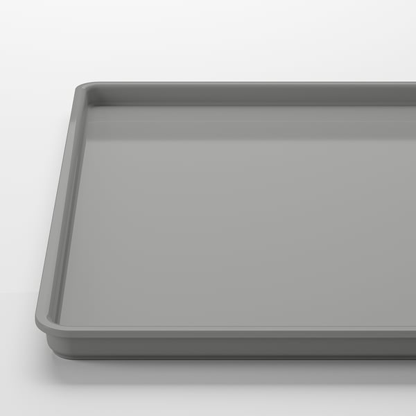 Grey rectangular plastic lid, smooth surface, even edges.
