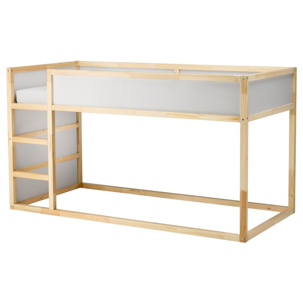 An ikea KURA light wooden bunk bed in natural finish, designed for children.