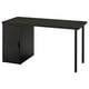A black LAGKAPTEN desk with a cabinet and metal legs, featuring a minimalist design.