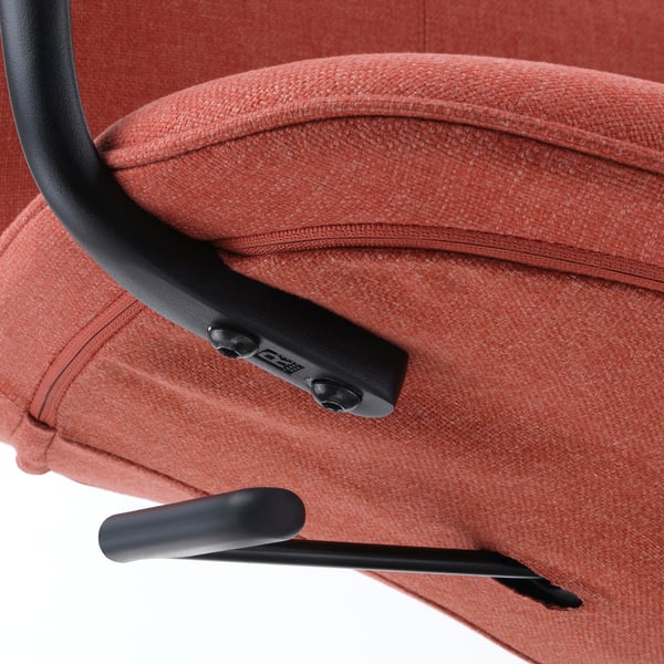 A red office chair with black armrests and tilt mechanism detail.
