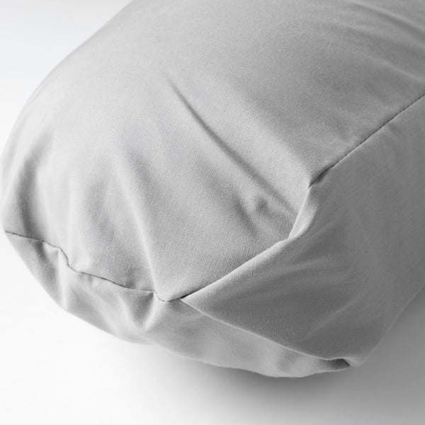 Soft, grey nursing pillow cover with smooth texture, made from natural materials.
