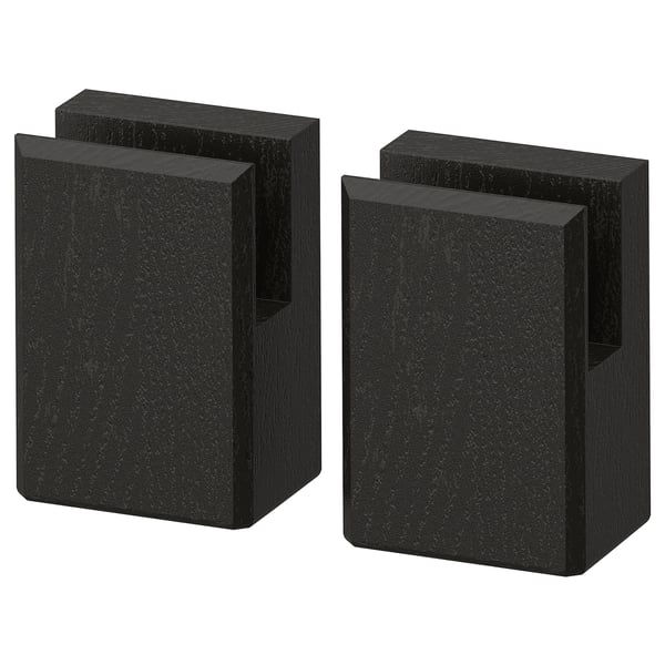Two black square bookends with bevelled edges and solid ash material.