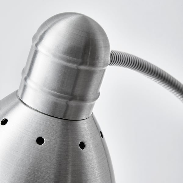 Modern floor lamp with adjustable metal neck, perfectly angled for reading.