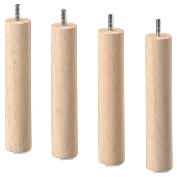 Four light-colored wooden legs with threaded ends arranged side by side.