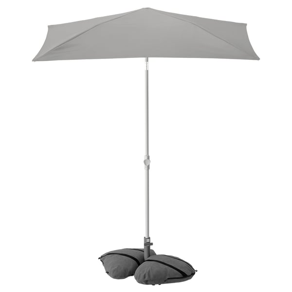 A LILLEÖ grey, rectangular balcony parasol with a tilt feature for sun protection. It uses a weighted base for stability.