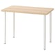 A LINNMON desk with a light wooden top and white, adjustable legs.