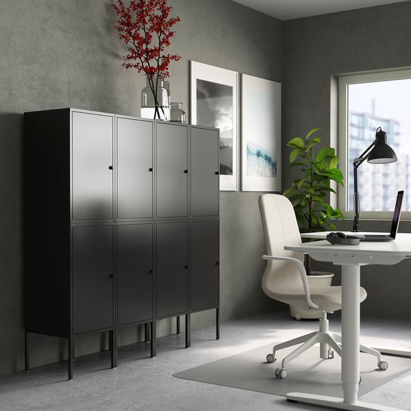 Grey LIXHULT storage cabinet with 4 doors in home office. Or grey LIXHULT cabinet with 4 doors beside desk in home office.