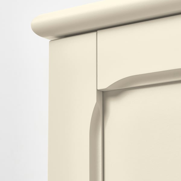 Close-up of sleek, cream-colored cabinet corner, showing smooth finish and sturdy design.