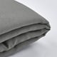 Close-up of grey LYNGÖR cushion cover, showcasing texture and stitching.