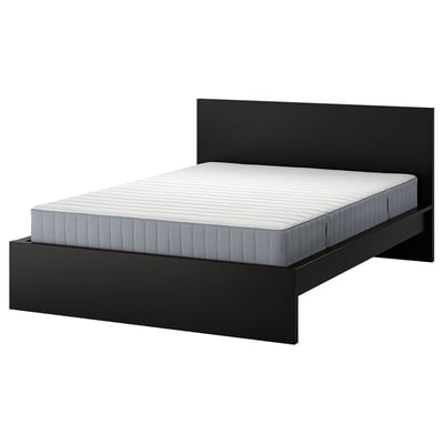 Modern black bed frame with gray quilted mattress, sleek design, and high headboard.