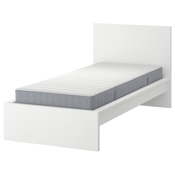 White MALM bed with grey mattress. Modern, minimalist design with adjustable bed sides and high headboard for comfort and support.