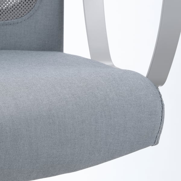 Close-up of a modern office chairs cushioned seat. Padded with fabric, designed for comfort.