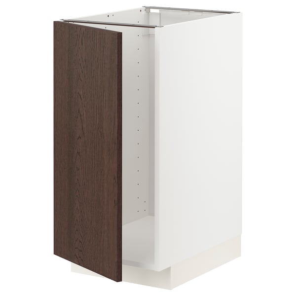 A white METOD kitchen cabinet with a dark brown wood veneer door. It modern design with snap hinges.