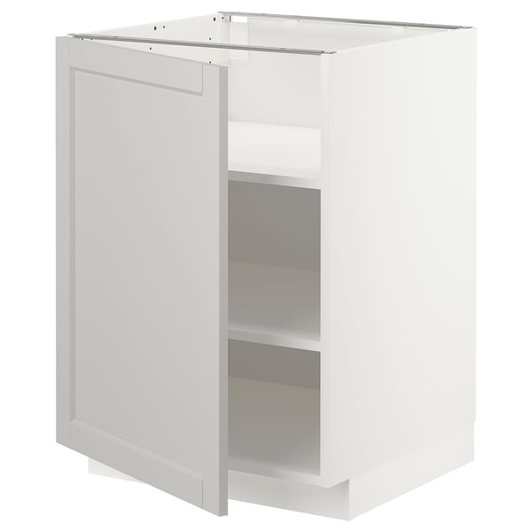 White METOD kitchen cabinet with adjustable shelves, light grey lerhyttan fronts.