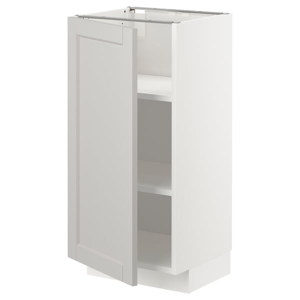 White METOD kitchen cabinet with grey lerhyttan doors, featuring adjustable shelves and a sturdy frame.