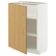 Open white and oak METOD kitchen cabinet with shelves.
