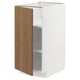 A white and wood-grain kitchen cabinet with one open door, displaying adjustable shelves.