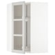 Open white corner kitchen unit with glass doors, adjustable shelves inside, modern design.