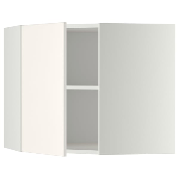 White METOD kitchen cabinet, curved design, with one open section, smooth surfaces.