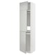 A white METOD kitchen cabinet with light grey havstorp doors. It a sleek, modern design with a tall, rectangular shape.