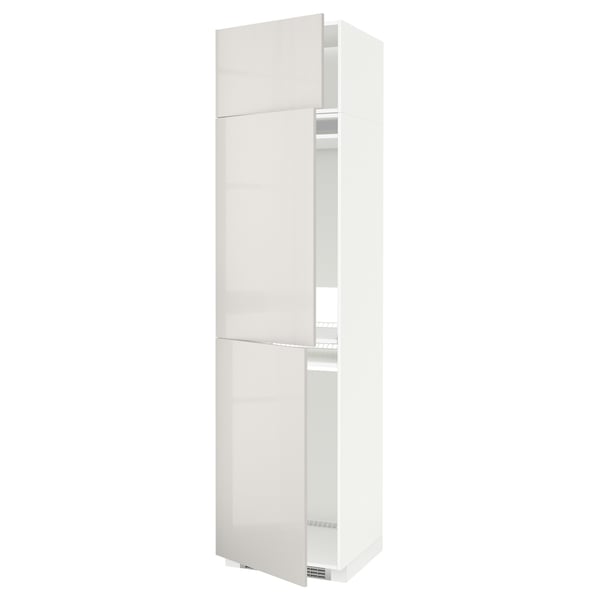 White METOD kitchen cabinet with high gloss finish, tall and slim, featuring multiple shelves and adjustable hinges.