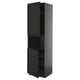 A black, tall kitchen cabinet with beveled edges from the METOD system, featuring two adjustable shelves.