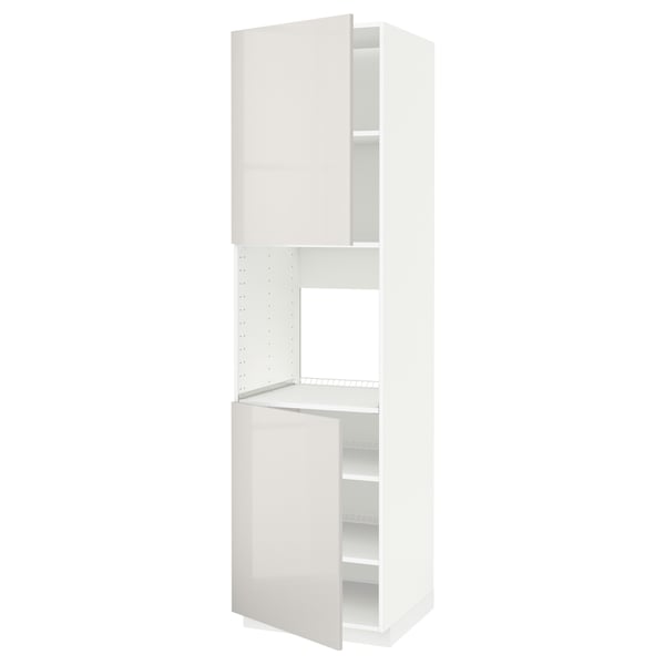 A white METOD kitchen cabinet with a modern high gloss finish. It adjustable shelves and a reversible door.