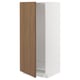 This image shows a white METOD kitchen cabinet with a wooden door partially open. The cabinet has a sleek, modern design and includes shelves inside.