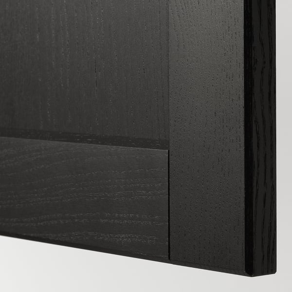 Black wooden panel with smooth, bevelled edges, showcasing high-quality craftsmanship and a sleek finish.