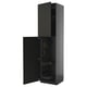 Black METOD cabinet with open door, metal shelves, modern design.