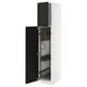 White METOD cabinet with black stained doors, beveled edges, pull-out organizers, and 25-year guarantee.