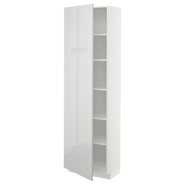 A white METOD high cabinet from ikea with a glossy finish and adjustable shelves.