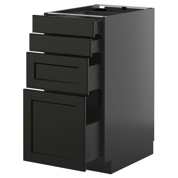 Black stained ash drawers in modern kitchen cabinet, with beveled edges and sleek design.