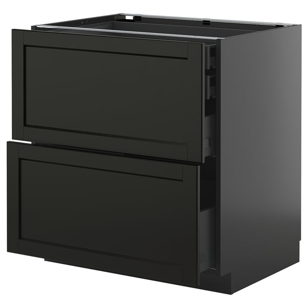 Black METOD kitchen unit with drawers, dark wood finish, boxy design.
