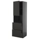 A modern, tall black kitchen cabinet with two drawers and an open shelf at the top. It a sleek, contemporary design.