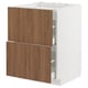 Modern white METOD kitchen cabinet with walnut drawers, sleek design, smooth drawers.
