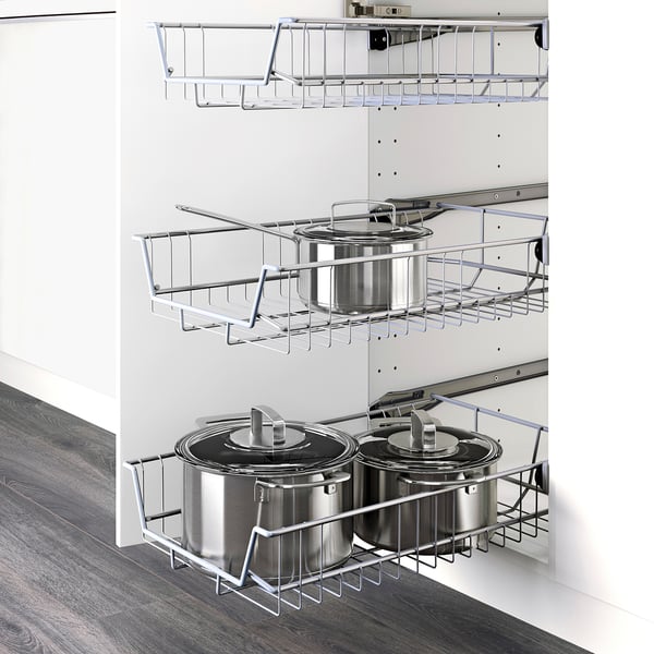 Modern kitchen storage with 3 metal pull-out baskets for pots, sturdy frame, self-closing drawers.