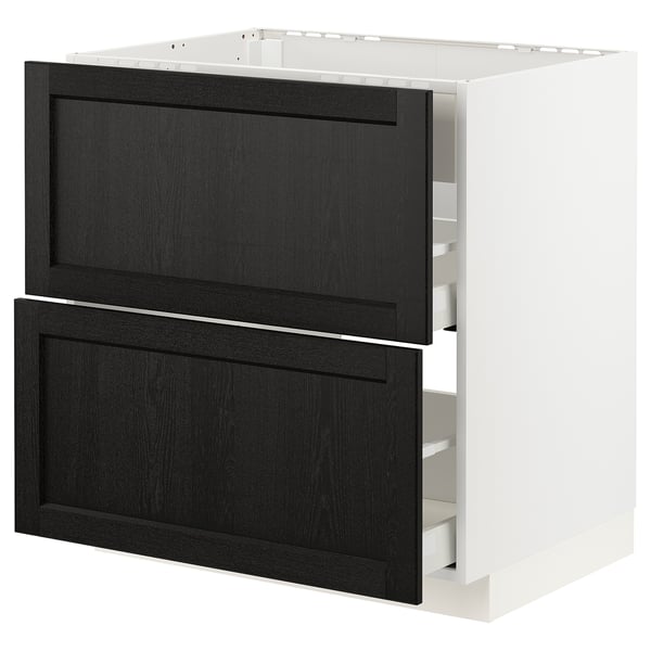 Black stained wooden drawers on white cabinet, modern kitchen design.