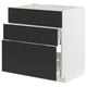 An ikea METOD kitchen cabinet with black nickebo drawers and a white frame, featuring a modern and sleek design.